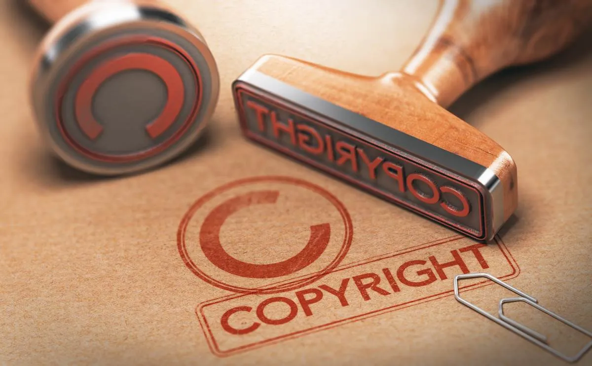 Stamp with copyright symbol on paper